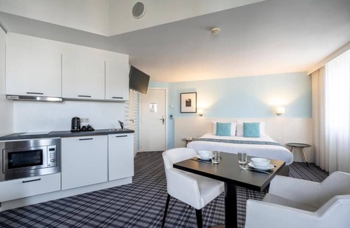 Ostend City Centre Hotel | Relaxing Room with Kitchenette | Quick Access to Local Attractions