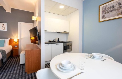 Ostend City Centre Hotel | Relaxing Room with Kitchenette | Quick Access to Local Attractions