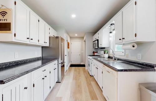 Penn Yan House | Relaxing two-story home with a deck, firepit, game room, & washer/dryer