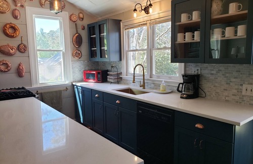 McCain Cottage | Remodeled 1840s cottage with private pool by Jordan Lake!