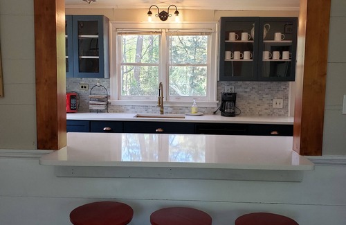 McCain Cottage | Remodeled 1840s cottage with private pool by Jordan Lake!