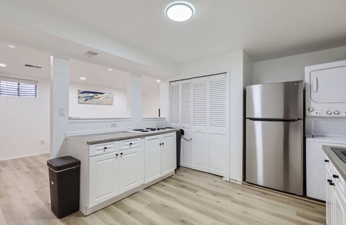 Montbello House | Remodeled 4BR Home: 2 Kitchens, Big Yard, Firepit, Near Downtown