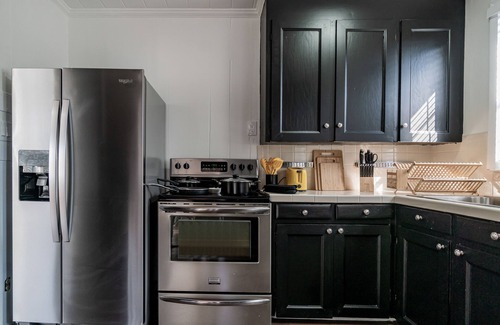 Delray Beach House | Remodeled HEATED pool house, 8 minutes to the beach! Honey Hole theme