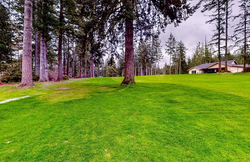 Union House | Remodeled home with game room, modern amenities, & golf course views