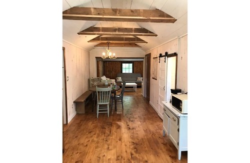 Ludington Cottage | Remodeled lakefront cottage w/marina, firepit, swimming area.