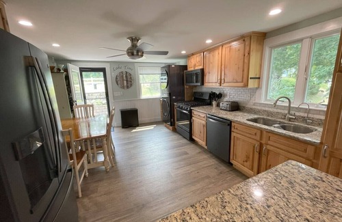 Lochmere House | Remodeled Winnisquam Lakefront Home - Private Dock/AC/Dogs/Kayaks/SUPs/Fire Pit