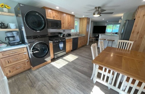 Lochmere House | Remodeled Winnisquam Lakefront Home - Private Dock/AC/Dogs/Kayaks/SUPs/Fire Pit