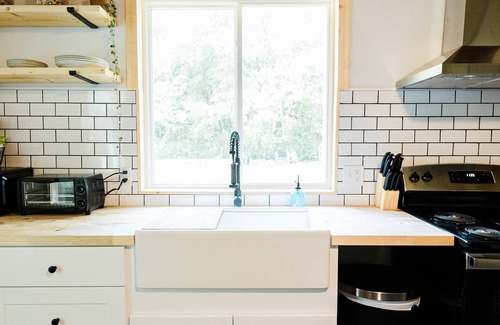 Northport House | Renovated 1940's Grocery Store- Oliver Height's Tiny Home