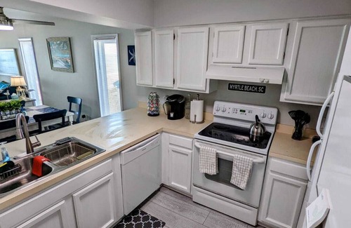 Windy Hill Condo | Renovated 2 bedroom ocean front condo - Right on the beach!