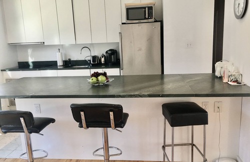 Hay Beach House | Renovated and Spacious Summer Home with Water View on Picturesque Island.