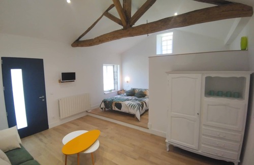 Monsireigne House | Renovated farmhouse guestroom with private terrace and lake view