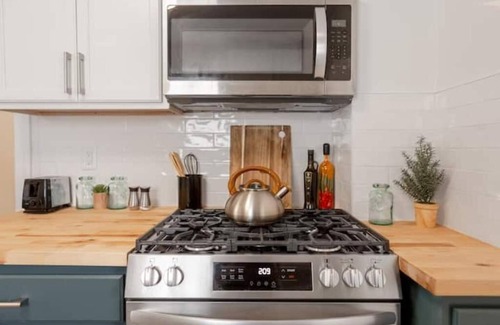 Turner Park House | Renovated Spacious Mansion near TU and Gathering Place. Pet/Family Friendly!