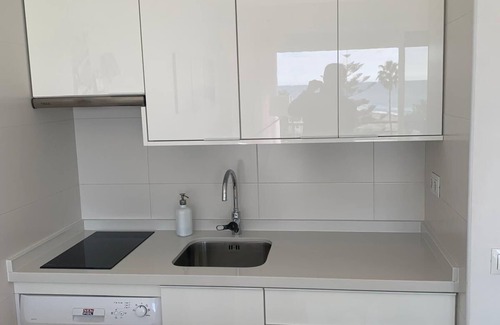 Carihuela Apartment | Renovated studio on the beachfront, wifi, satellite TV and air conditioning
