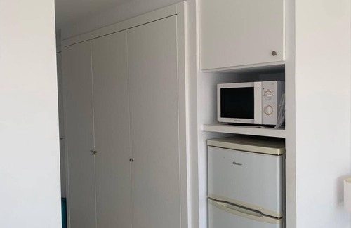 Carihuela Apartment | Renovated studio on the beachfront, wifi, satellite TV and air conditioning
