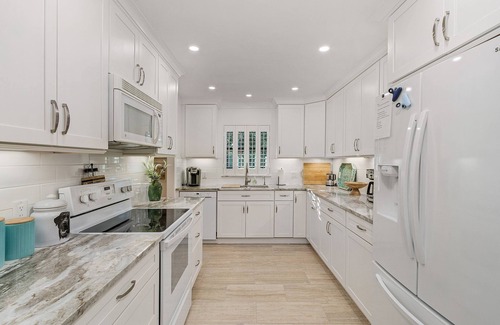 Moorings Villa | Renovated Villa less than 1 mile to beach with Pool & Spa! Dog Friendly!