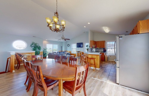 Wind Over Waves House | Renovated water-view house with private pool, hot tub, game room, & central AC