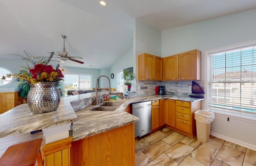 Wind Over Waves House | Renovated water-view house with private pool, hot tub, game room, & central AC