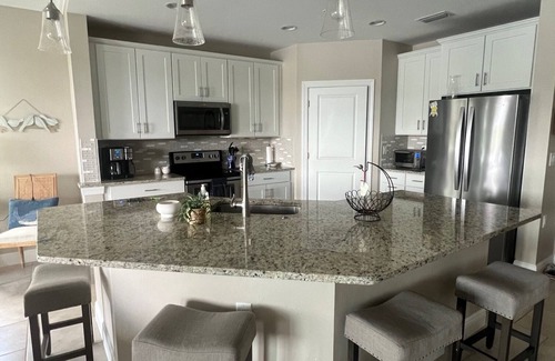 Pelican Preserve Condo | Resort Style 55+ Community! Includes golf cart and amazing sunset views!