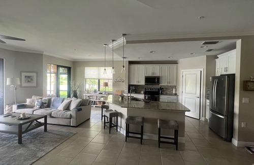 Pelican Preserve Condo | Resort Style 55+ Community! Includes golf cart and amazing sunset views!