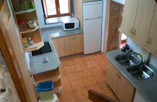 Louredo House | Restored house with dream garden in Carnota