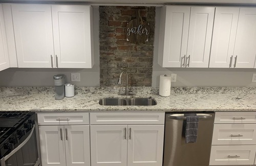 Uptown Historic District House | Restored Rustic Uptown Getaway Walk to Everything