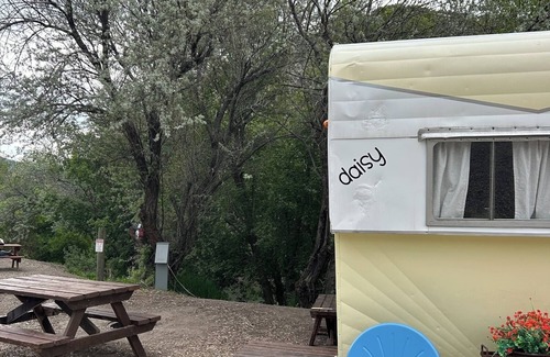 Lava Hot Springs House | Retro Camper king size bed