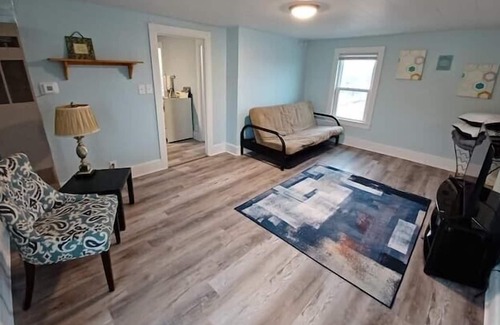 Two Rivers Apartment | Retro-Chic Riverfront Duplex on River St - Upper