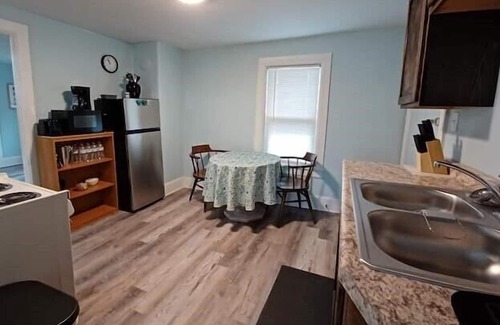 Two Rivers Apartment | Retro-Chic Riverfront Duplex on River St - Upper