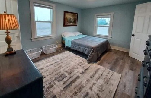 Two Rivers Apartment | Retro-Chic Riverfront Duplex on River St - Upper