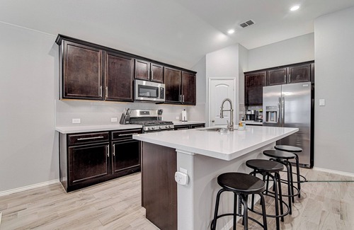 Haslet House | Rev Your Engines: Race to This Perfect Family Retreat!