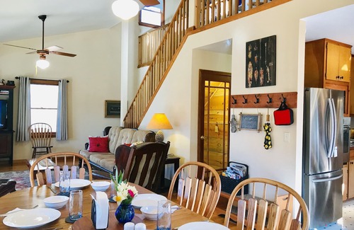 Cornelia House | Right on the ChattahoocheeRiver - visit Helen, fish off deck, or enjoy fire pit.