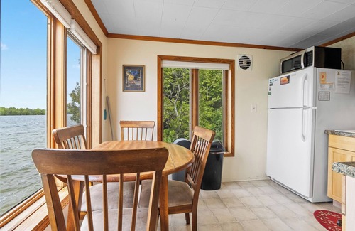 Baileys Harbor Cabin | Right on the water-Dog Friendly Cottage with kids playground