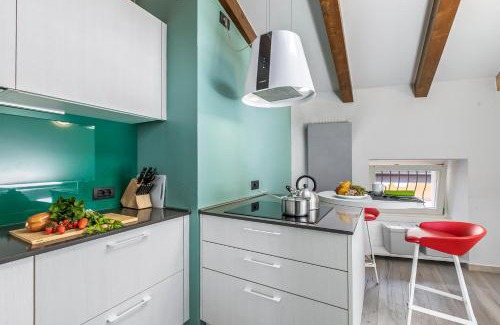Riva del Garda Apartment | Riva's Rooftop Retreat - Happy Rentals