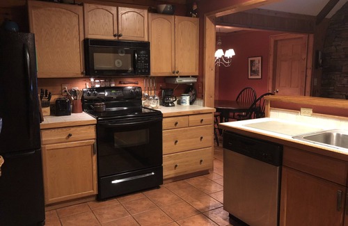 Rutherfordton Cabin | River front log home 3 miles from Tryon Equestrian Center, gated community