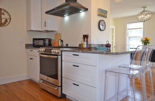 Gloucester House | River's Edge: A charming 2BR riverfront home in Gloucester.