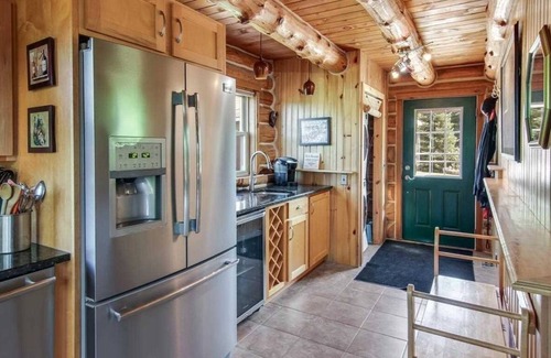 South Boardman House | Riverfront Beach Lodge Home in the Heart of Snowmobile Trails