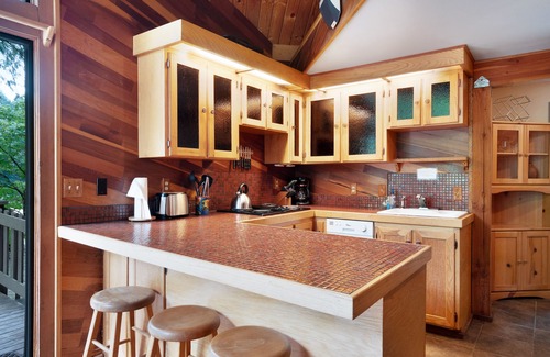 Baring Cabin | Riverfront cabin with soaring views of mountains & woodstove - dog-friendly