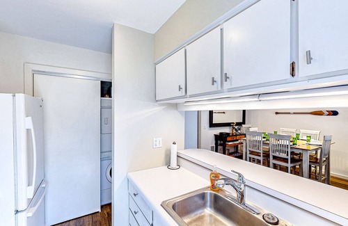 Glen Arbor House | Riverfront condo with lake access, views, deck, washer/dryer, community firepit
