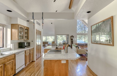 Carver House | Riverfront, dog-friendly home with gorgeous setting, floating tubes & grand piano
