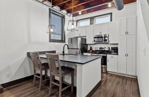 Downtown St. Louis Apartment | Riverfront Loft - Private Balcony - King Bed - Arch, Conventions & Casino
