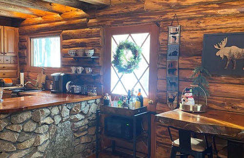 Wentworth Cabin | Riverfront Log Cabin with Mountain Views - Hot Tub & Wood Burning Fireplace