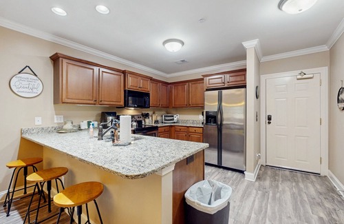 Helen Condo | Riverfront oasis with dual suites, 3 fireplaces, central AC, & walkable locale