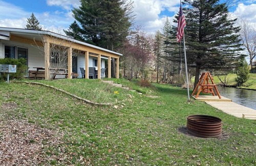 Grayling House | Riverfront Retreat in Grayling