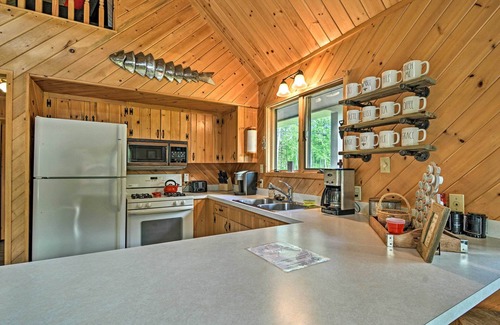 Mayfield Cabin | Riverfront Traverse City Cabin Near Snowmobiling!