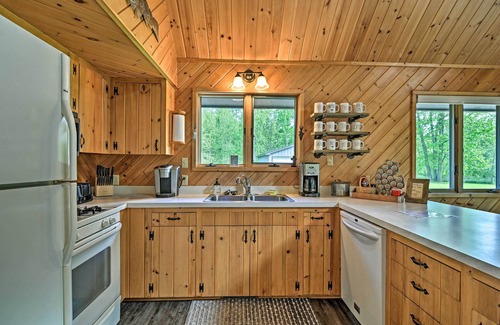Mayfield Cabin | Riverfront Traverse City Cabin Near Snowmobiling!