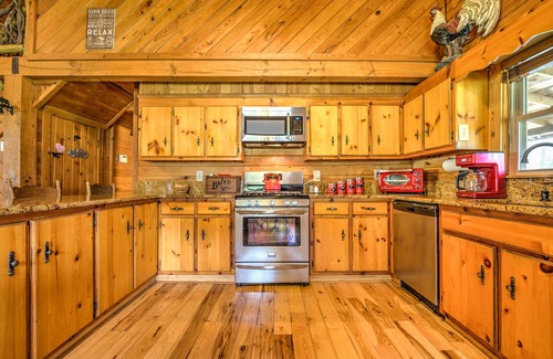 Canton Cabin | Riverside Cabin with Hot Tub and firepit pet Friendly