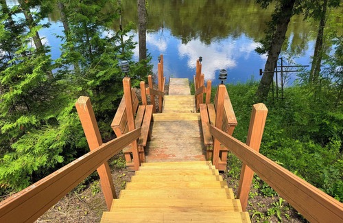 Oconto House | Riverside Retreat: Where Nature & Luxury Meet
