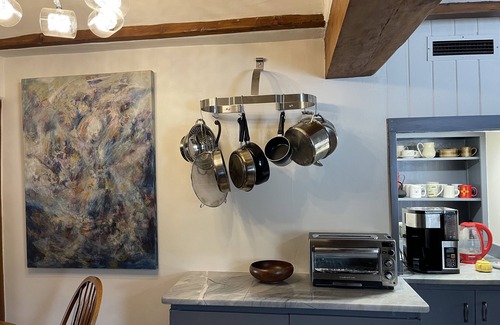 Taos House | Rock Art Retreat—A gorgeous estate full of petroglyphs and colorful artwork.