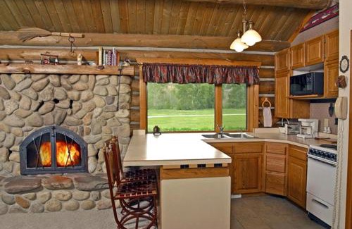 Darby House | Rocky Mountains Nature Escape: Amazing Log Cabin with a Hot Tub in Darby, MT