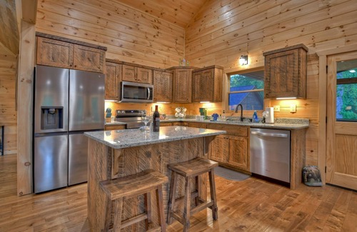 Mineral Bluff Cabin | Rohring Retreat - Bask in comfort on the deck and play games in the game room!